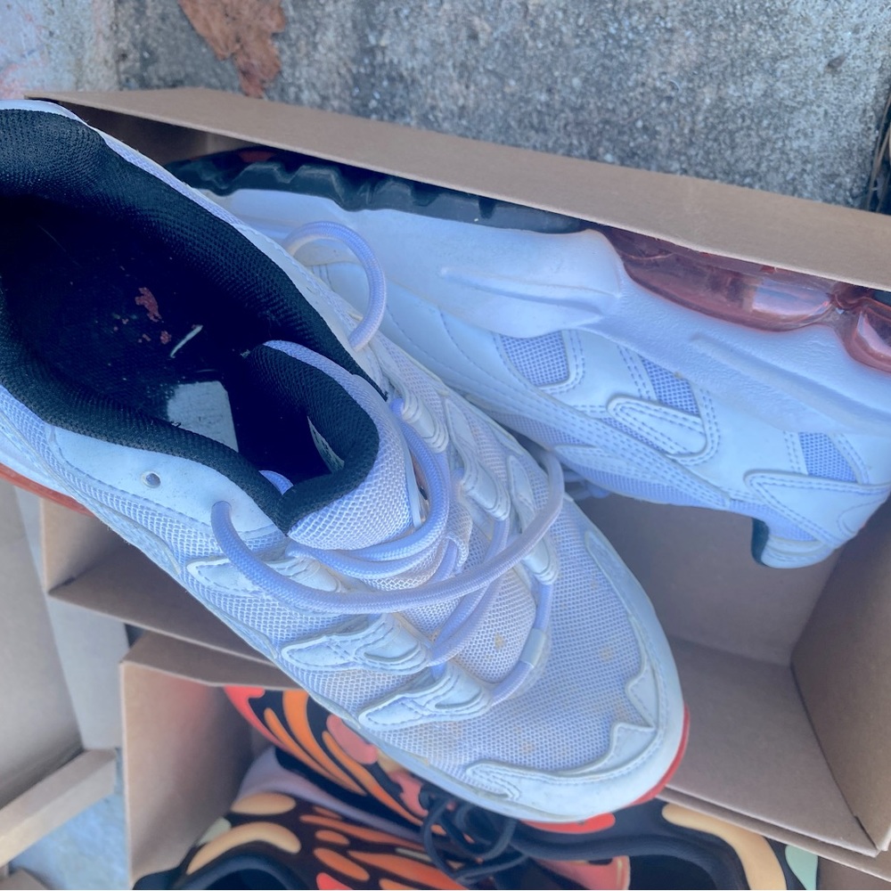 Red, white, & black Puma Cell Sneakers